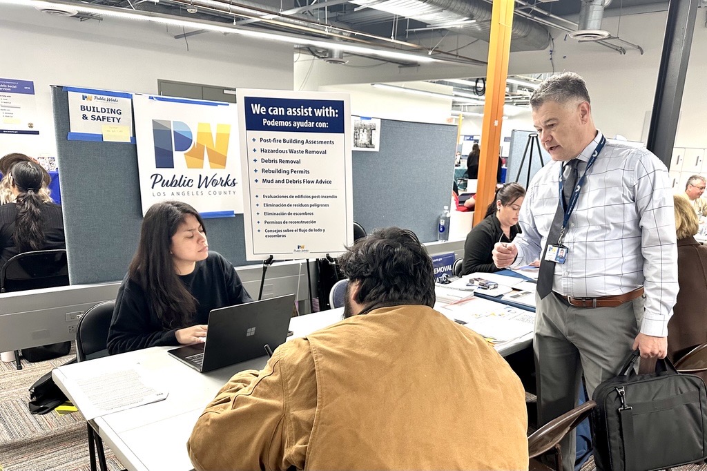 A one-stop resource shop for permits is set up at the Altadena Disaster Recovery Center.